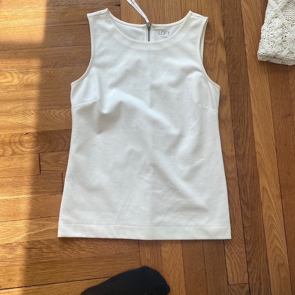 White sleeveless blouse